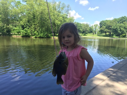Greta caught the biggest bluegill in the pond